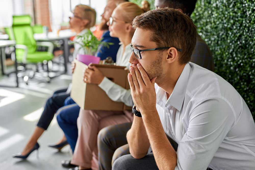 Man with concerned expression in office environment - representing difficulty scaling