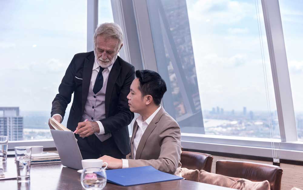 Business professionals collaborating on strategy